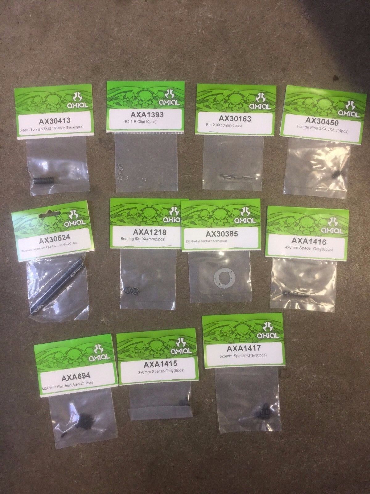 New Axial Misc Parts - 11 Bags of Parts in Lot